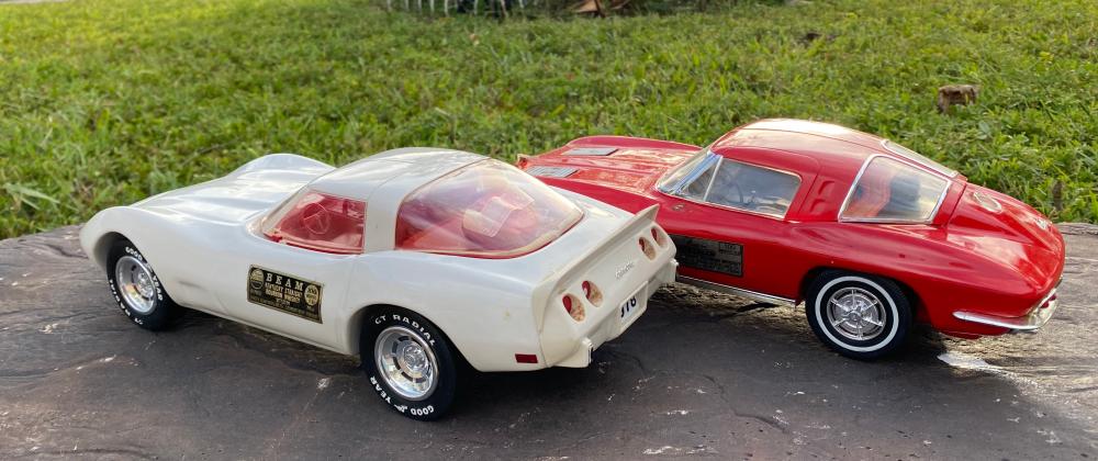 Appraisal: TWO VINTAGE JIM BEAM CORVETTE DECANTERS W CONTENTSCirca Each with