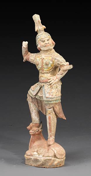 Appraisal: A painted pottery lokapala Tang Dynasty Dressed in layered armor