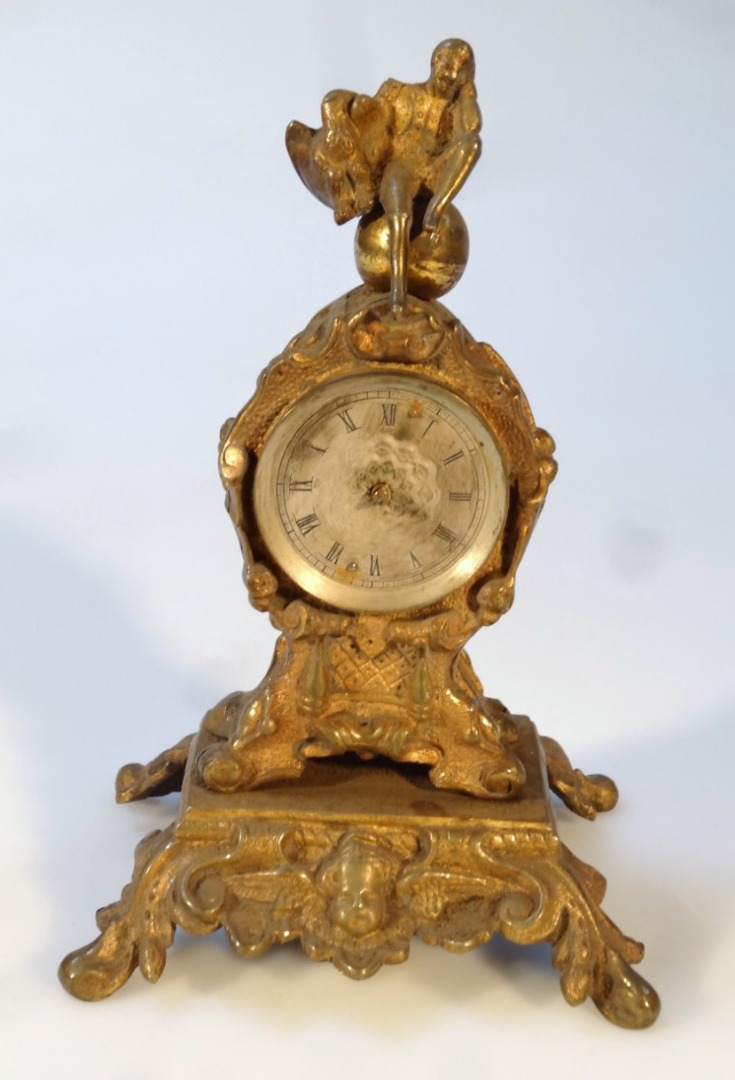 Appraisal: A thC rococo design travel clock the gilt metal case