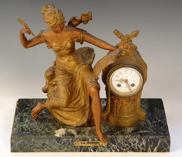 Appraisal: X RAPHANEL FRENCH FIGURAL MANTLE CLOCK Figural bronzed spelter clock