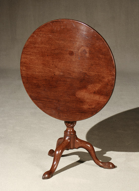 Appraisal: George III Mahogany Tilt-Top Tripod Tea Table Circa The top