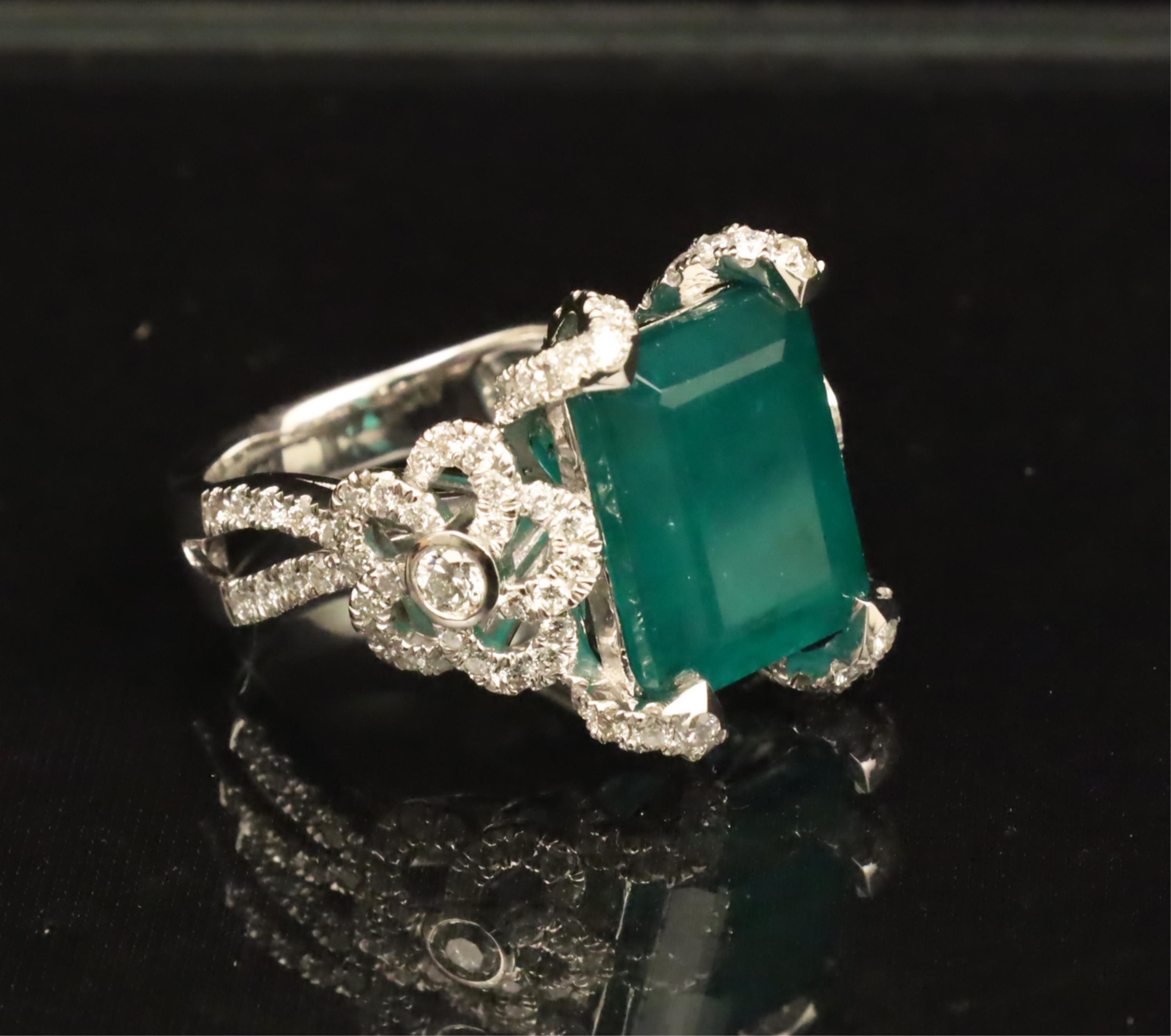 Appraisal: PLATINUM EMERALD AND DIAMOND RING W GIA Platinum Emerald and