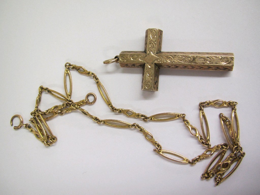 Appraisal: Lot comprising engraved yellow metal cross pendant and a ct