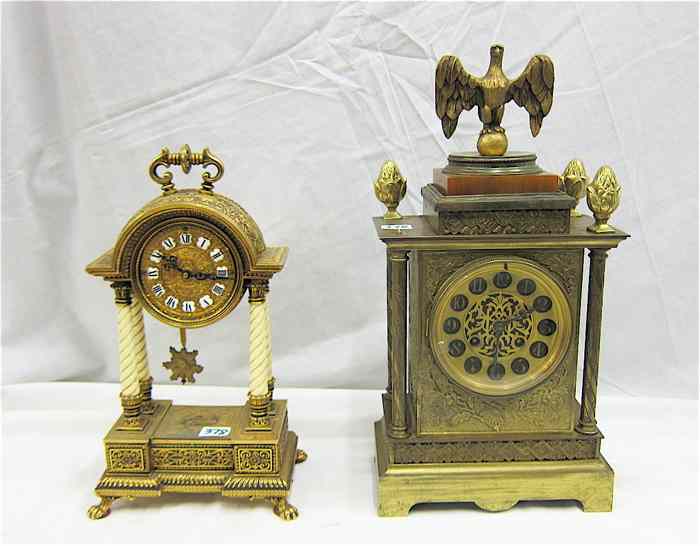 Appraisal: TWO METAL CASED SHELF CLOCKS Schmidt portico clock with springwound