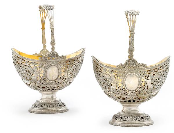 Appraisal: A pair Continental silver gilt baskets with gilt metal liners