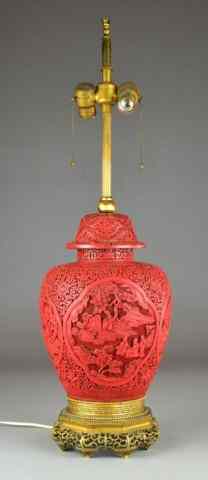 Appraisal: Chinese Carved Cinnabar Vase And CoverFinely carved with four panels