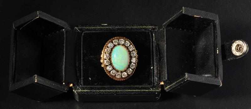 Appraisal: K Y Gold Opal Diamond Ring Description Circa Oval cut