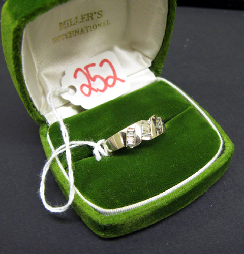 Appraisal: MAN'S DIAMOND AND FOURTEEN KARAT WHITE GOLD RING set with