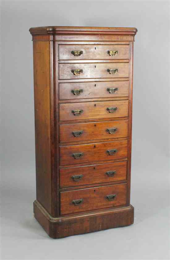 Appraisal: A late Victorian mahogany pillar chest with eight graduated drawers