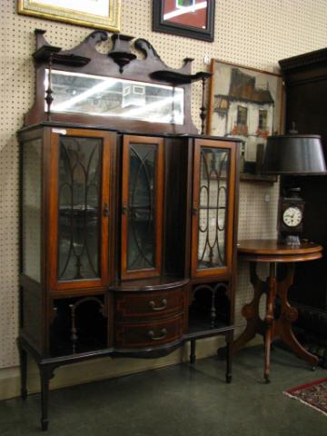 Appraisal: Vintage curio cabinet with mirror top mahogany triple glass doors