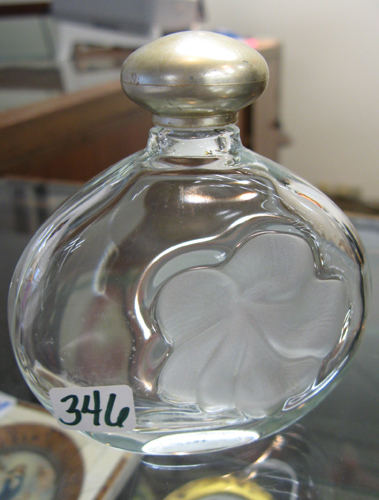 Appraisal: A LALIQUE FRANCE CLEAR CRYSTAL PERFUME BOTTLE designed by Nina