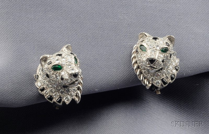 Appraisal: Platinum Diamond Onyx and Emerald Panther Earclips Cartier London each