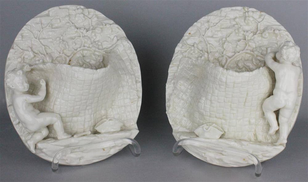 Appraisal: PAIR OF ROYAL WORCESTER GLAZED PARIAN WALL POCKETS late th