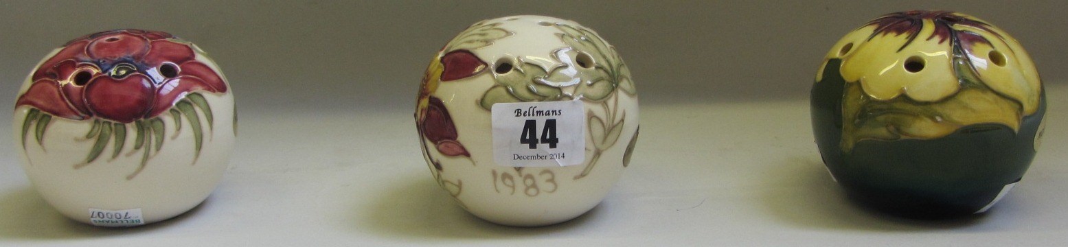 Appraisal: Three Moorcroft Liberty pomanders each tube line decorated and dated