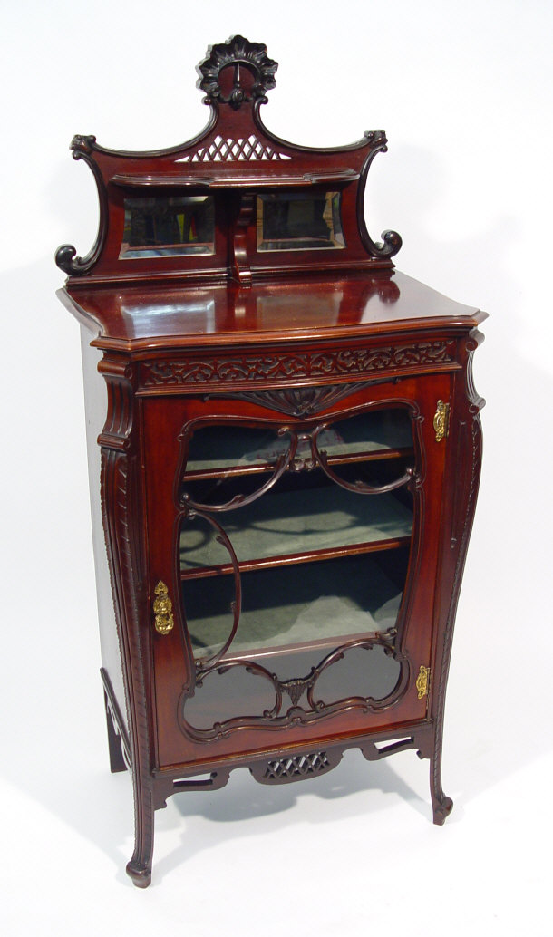 Appraisal: Edwardian mahogany music cabinet fitted with a mirrored and shelved