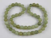 Appraisal: A jade bead necklace beads approx mm diameter cm long