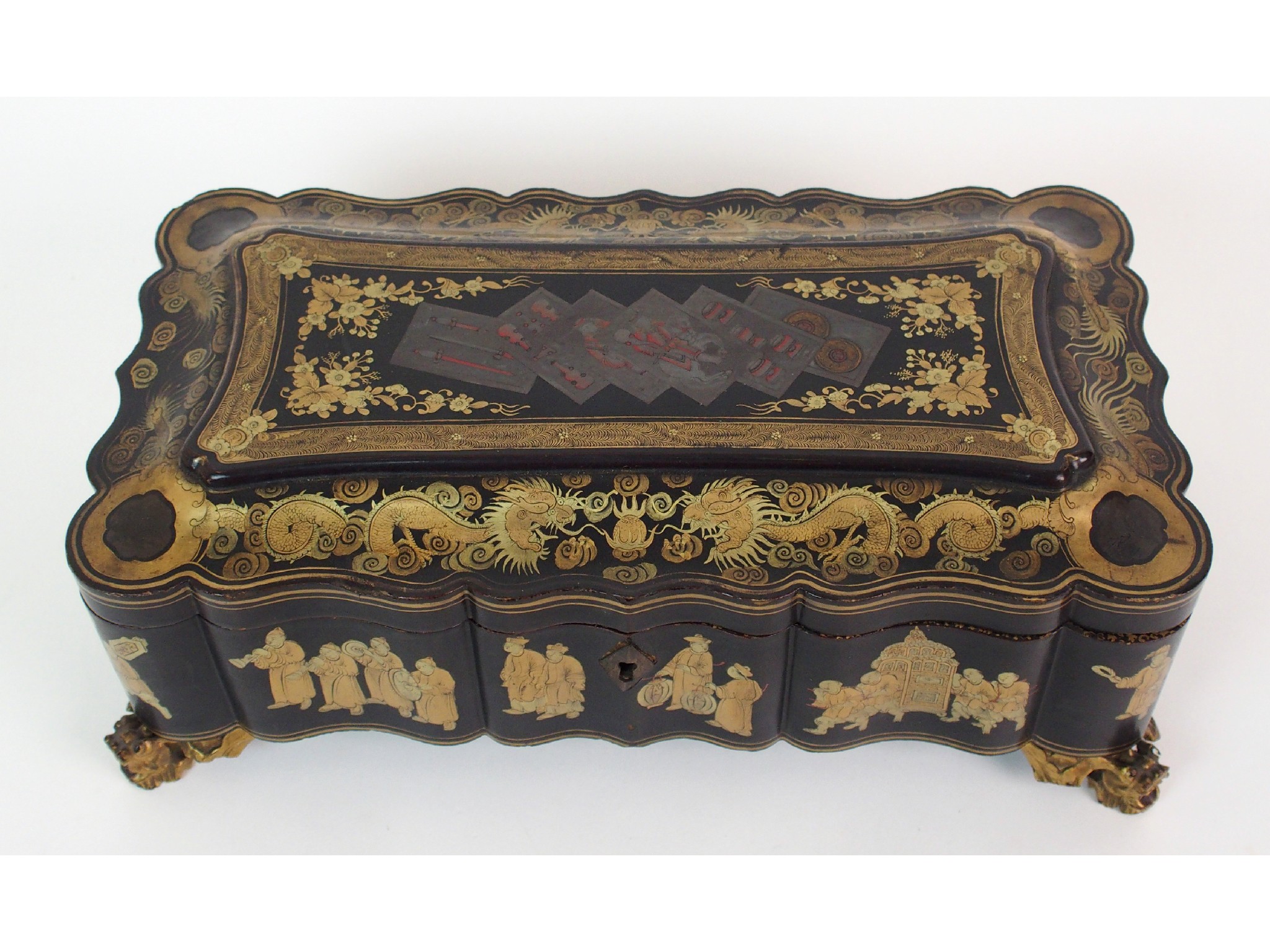 Appraisal: A Chinese export black and gold lacquered games boxgilt with