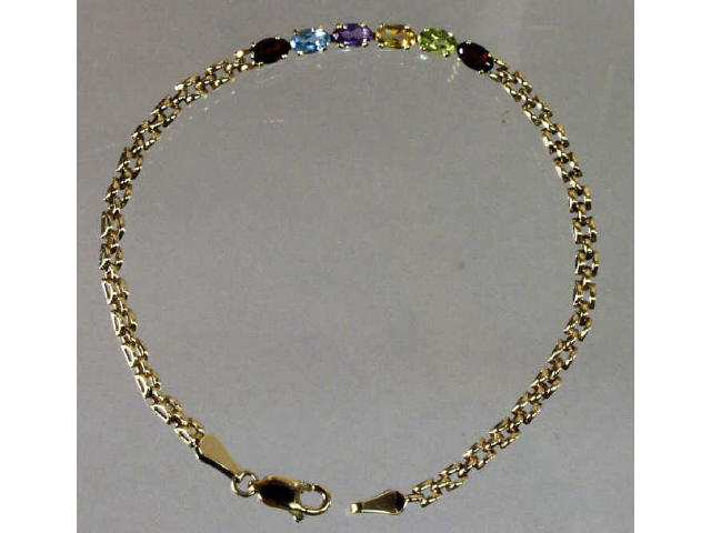 Appraisal: Ladies karat yellow gold multi-colored stone bracelet weighing approx carats