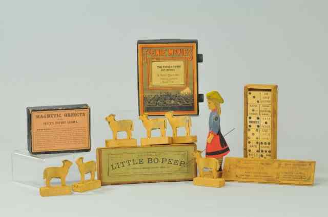 Appraisal: GROUPING OF EARLY BOXED TOYS Lot includes wooden Dominos with