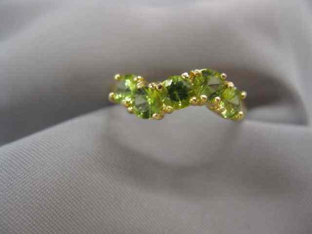 Appraisal: Peridot Ring round gems totaling carat in k yellow gold