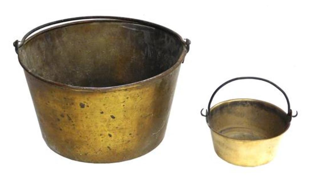 Appraisal: Two th C brass buckets with iron swing handles one