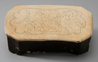 Appraisal: Cizhou Stoneware Pillow Chinese th century brown-glazed carved rectangular shape