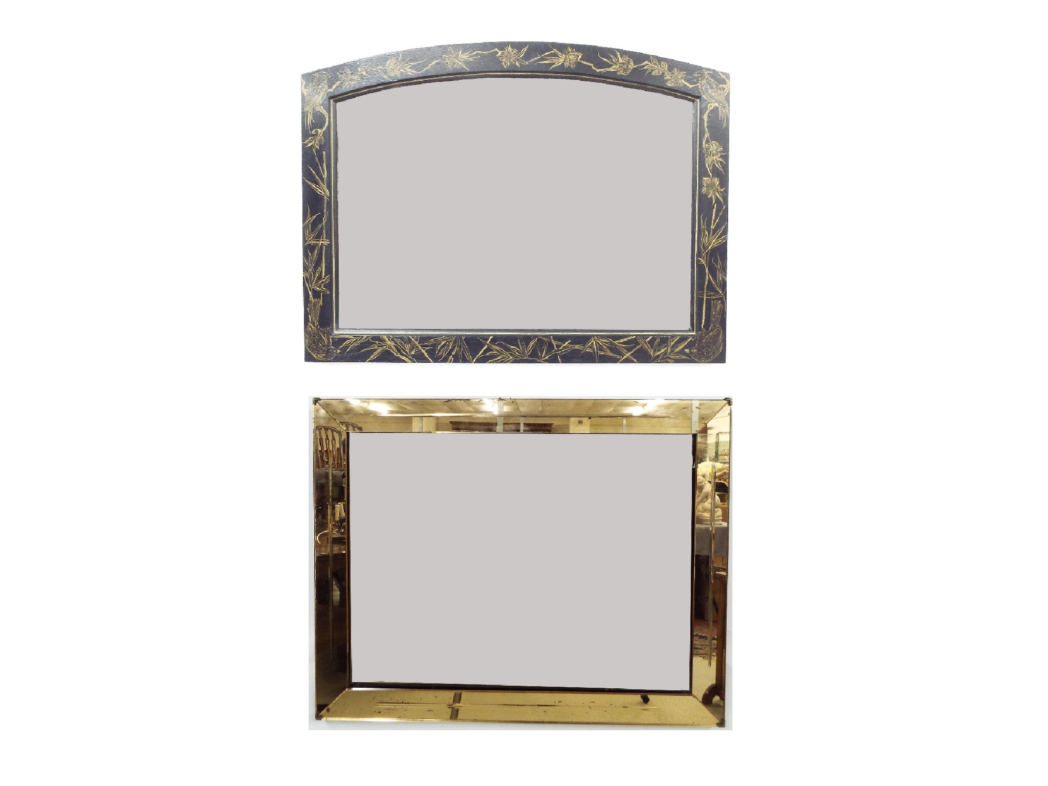 Appraisal: Ebonised bevelled glazed arch top wall mirror decorated with gilt