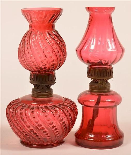 Appraisal: Two Cranberry Glass Miniature Fluid Lamps Two Antique Cranberry Glass