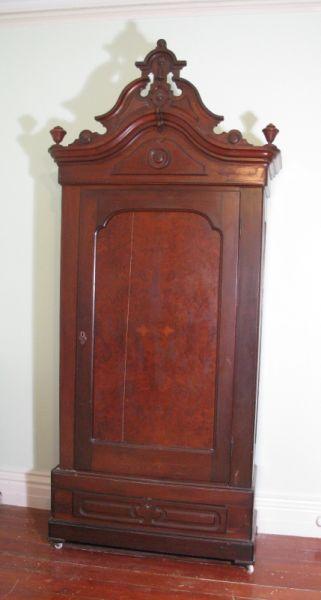 Appraisal: Victorian Renaissance Revival Wardrobe American ca walnut high pierced crest