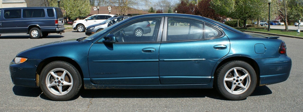 Appraisal: Pontiac Grand Prix aqua blue metallic with charcoal cloth interior