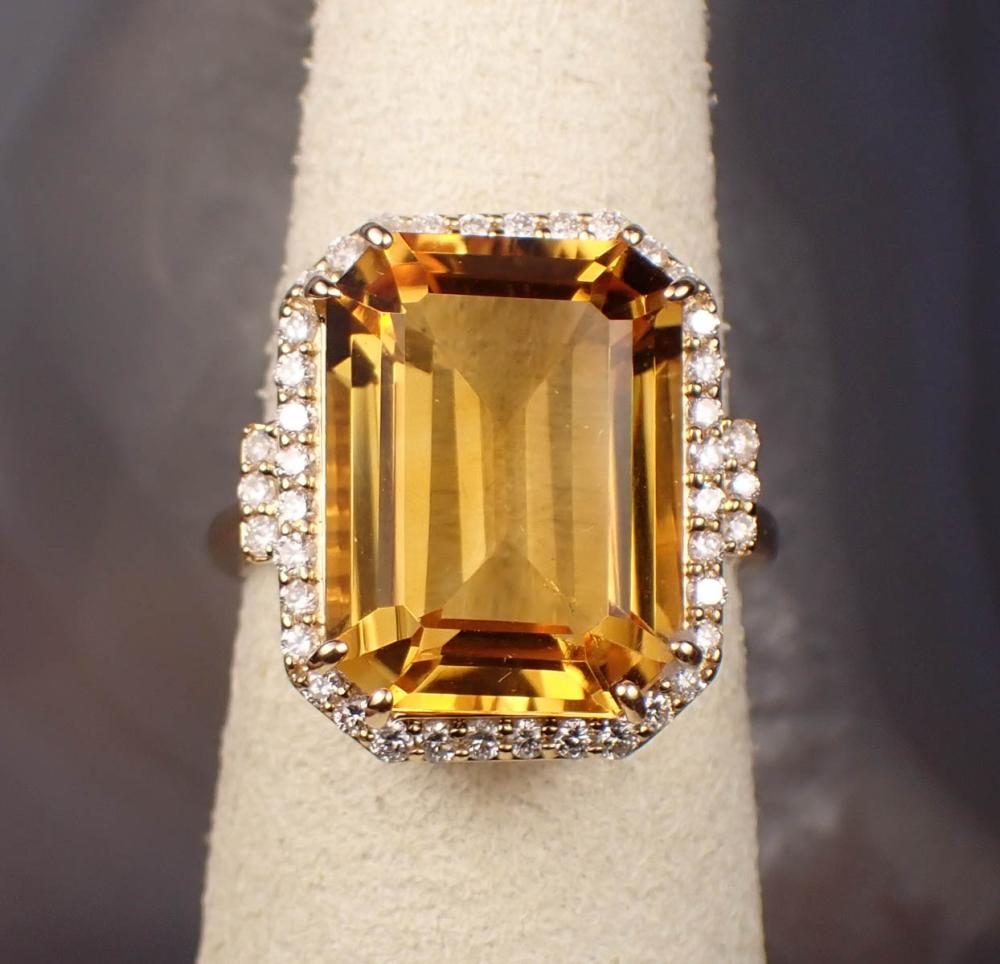 Appraisal: CITRINE DIAMOND AND FOURTEEN KARAT GOLD RING The yellow gold