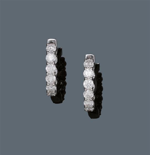 Appraisal: DIAMOND CREOLES White gold Casual-elegant creoles set throughout with brilliant-cut