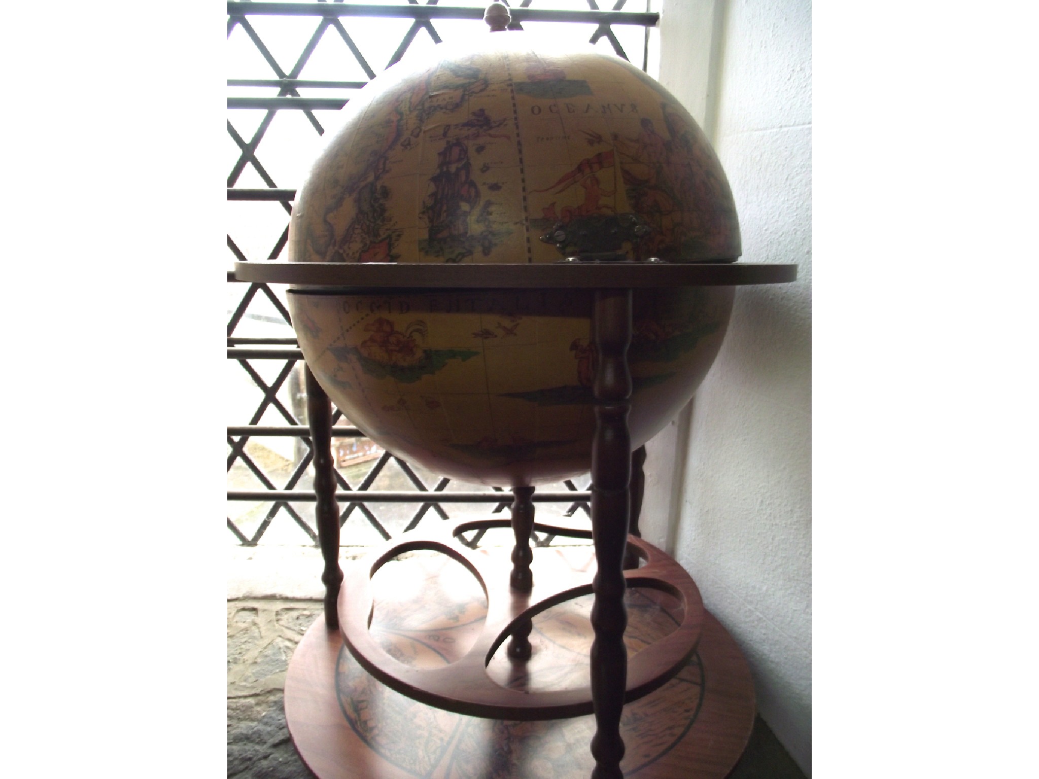 Appraisal: A contemporary drinks trolley in the form of a globe