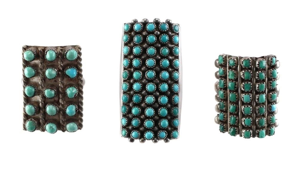 Appraisal: Native American sterling silver and turquoise snake eye style rings