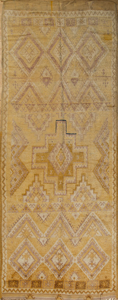 Appraisal: MOROCCAN SAFFRON GROUND LONG CARPET With label from Courante ft