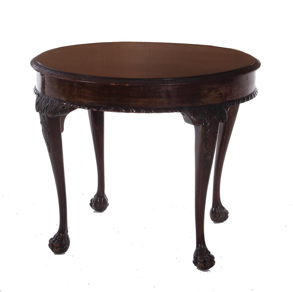 Appraisal: Irish carved mahogany center table circa carved molded edge and