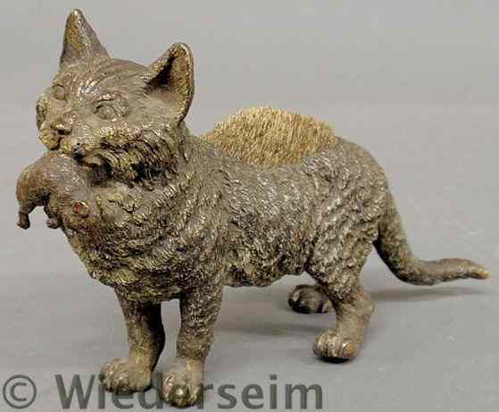 Appraisal: Large cold painted bronze cat carrying a mouse in his