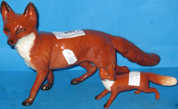 Appraisal: Beswick Fox standing tail restuck and Fox