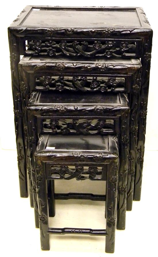 Appraisal: Carved Oriental nest of four stacking tables the largest is