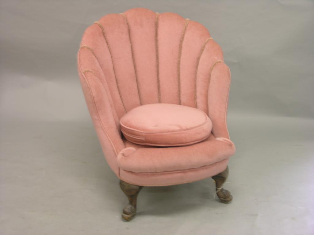 Appraisal: A Victorian oyster shell shape chair upholstered in a pink