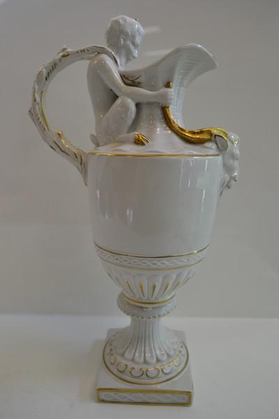 Appraisal: BLANC DE CHINE CAPODIMONTE EWER WITH A PAN THEMED JUG