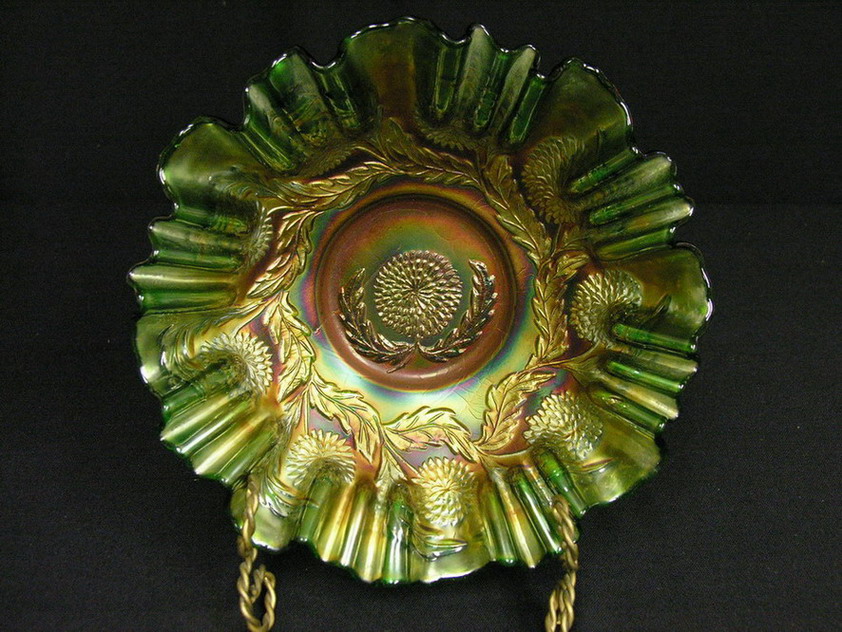 Appraisal: FENTON GREEN TEN MUMS CARNIVAL GLASS BOWL The bowl is