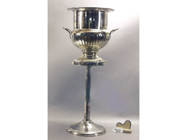 Appraisal: Large handled champagne ice bucket on floor stand with inner