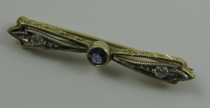 Appraisal: SAPPHIRE DIAMOND AND TEN KARAT GOLD PIN - in length