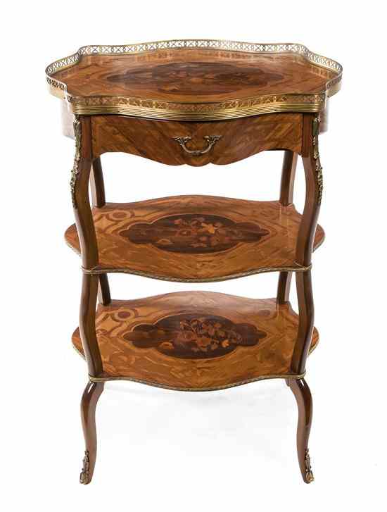 Appraisal: A Continental Marquetry and Gilt Metal Mounted Etagere having a