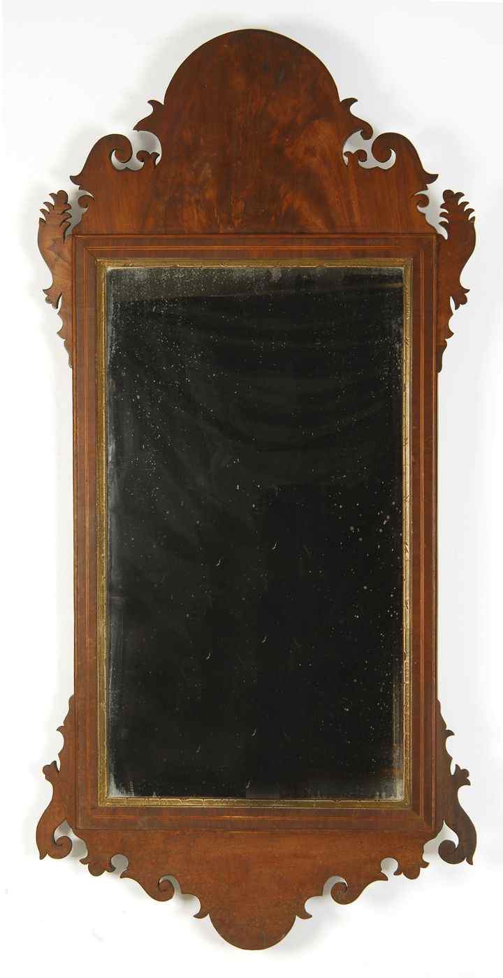 Appraisal: ANTIQUE ENGLISH CHIPPENDALE MIRROR th CenturyIn flame mahogany with scrolled