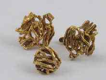 Appraisal: A pair of hallmarked ct gold cufflinks with matching tie