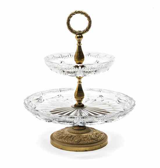 Appraisal: An Empire Gilt Metal and Cut Glass Pastry Stand having