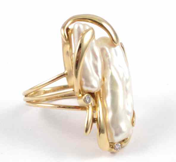 Appraisal: PEARL DIAMOND AND FOURTEEN KARAT GOLD RING set with a