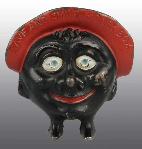 Appraisal: Cast Iron Save Smile Still Bank Description Manufactured by Harper